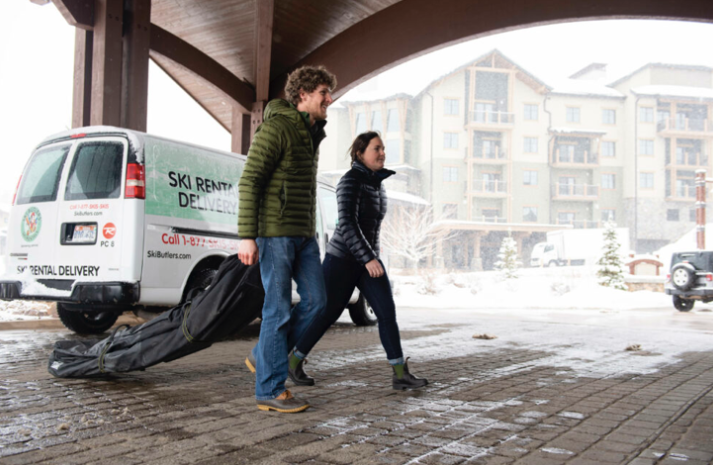 A person and person walking under a covered bridge

Description automatically generated